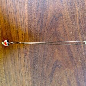 14k gold necklace 18” with glass heart like new